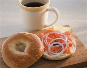 Bagel with coffee.