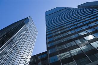 Low angle view of skyscrapers, New York City, New York, USA.