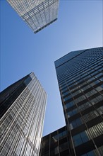 Low angle view of skyscrapers, New York City, New York, USA.