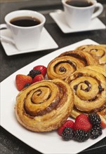 Cinnamon buns on plate.