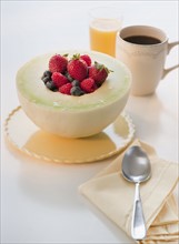 Studio shot of yogurt with fruits.