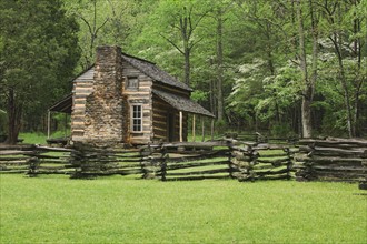 A fence and cabin in Smoky Mountain National Park.