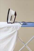 An ironing board with an iron.