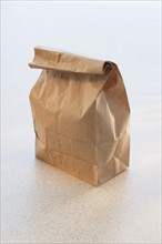 A brown paper lunch bag.