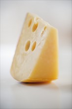 A piece of gruyere cheese.