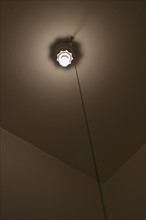 A lightbulb in a room.