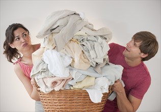 Couple doing laundry.