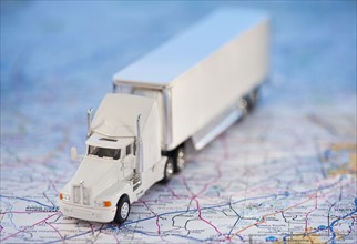 A toy truck on a map