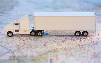 A toy truck on a map