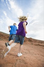 Two kids running at Red Rock