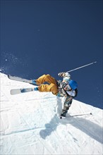 A downhill skier doing a trick