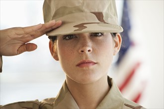 A military officer saluting