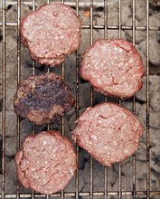 Hamburgers on a barbeque