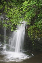 A scenic waterfall.