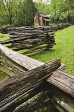 A fence and cabin in Smoky Mountain National Park.