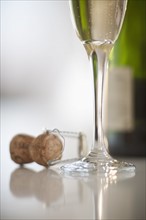 Champagne flute and cork.
