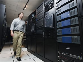 Man walking through data center