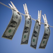 Dollars on clothes line
