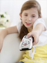 Child with TV remote