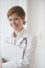 Female doctor smiling.