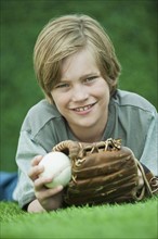 Boy with baseball and glove