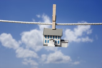 Symbolic house on clothes line