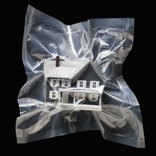 Shrink wrapped toy house