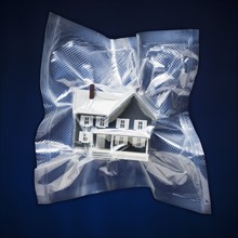 Shrink wrapped toy house