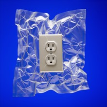 Shrink wrapped electricity receptacle