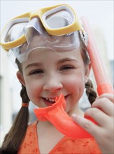Child with mask and snorkel