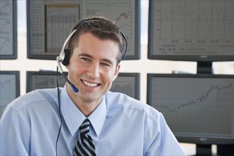 Male trader with headset.