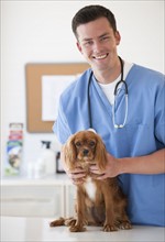 Vet with dog.