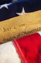 Declaration of Independence of top of American flag.