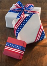 Gifts wrapped with Americana ribbons.