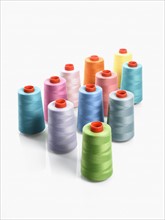 Colored spools of thread