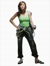 Portrait of a woman with climbing gear