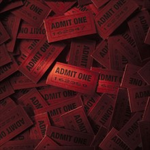 Pile of red admit one tickets