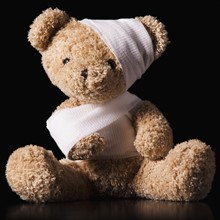 Injured Teddy Bear wrapped in bandage