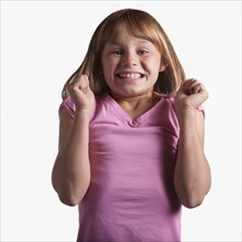 Portrait of excited young girl
