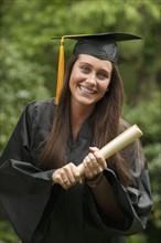 Graduate with diploma