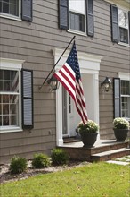 American flag on house.