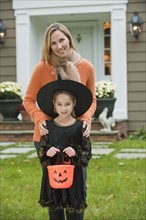 Girl dressed as witch.