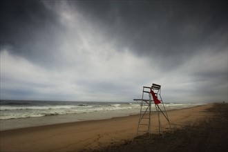 Lifeguard chair on beach.