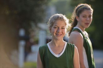 Girls in sports uniforms