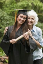 Graduate and elderly woman