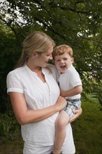 Woman holding boy