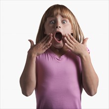 Portrait of surprised young girl