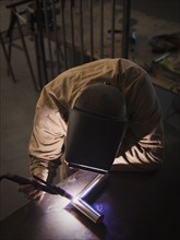 Steel worker in metal shop