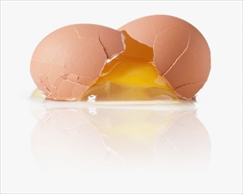 Cracked egg with a shattered yoke
