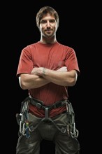 Portrait of male climber wearing harness